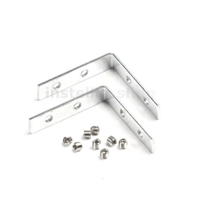 Соединитель профиля угловой для встраиваемого магнитного шинопровода под гарпунную систему с боковыми маскирующими вставками и заглушками, instellar